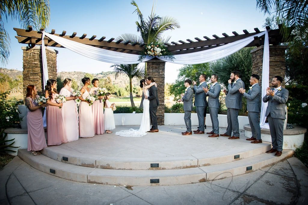 Romantic wedding couple portrait in Fallbrook with scenic outdoor backdrop and soft light
