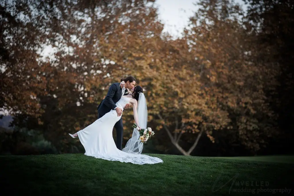 Romantic Fallbrook wedding couple portrait with soft light and scenic outdoor backdrop

