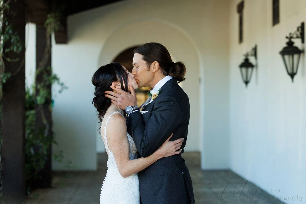 Romantic wedding couple portrait outdoors in Fallbrook with soft light and natural scenery
