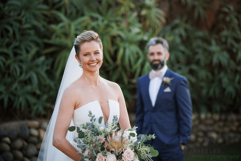 Second wedding Photographer captures a smiling bride with true-to-life color.