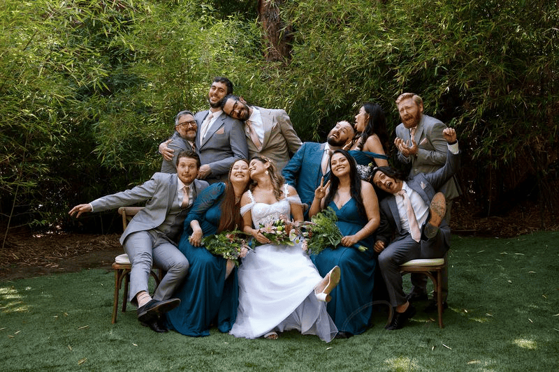 Fun group photo for a Wedding Photography Shot List featuring the bride and bridal party.