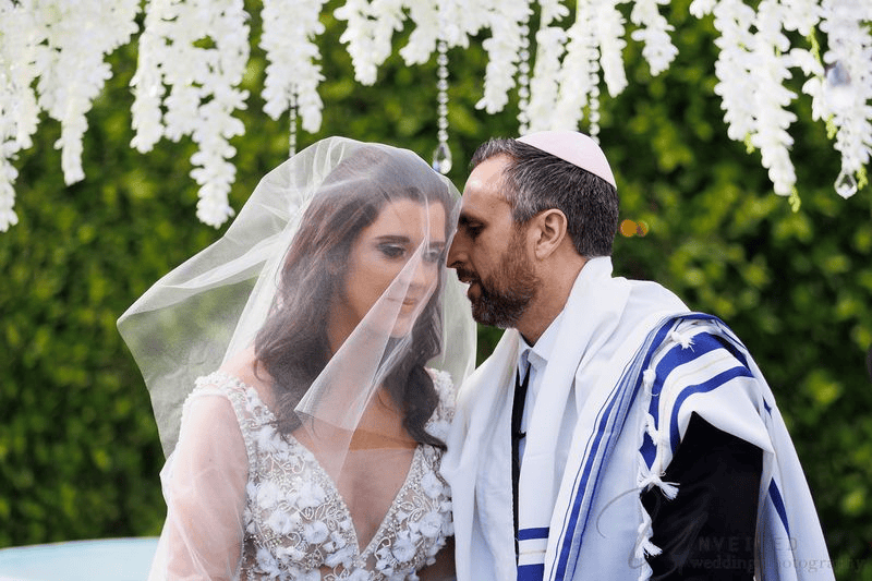 Estancia La Jolla wedding photography of a bride and groom during a Jewish ceremony.