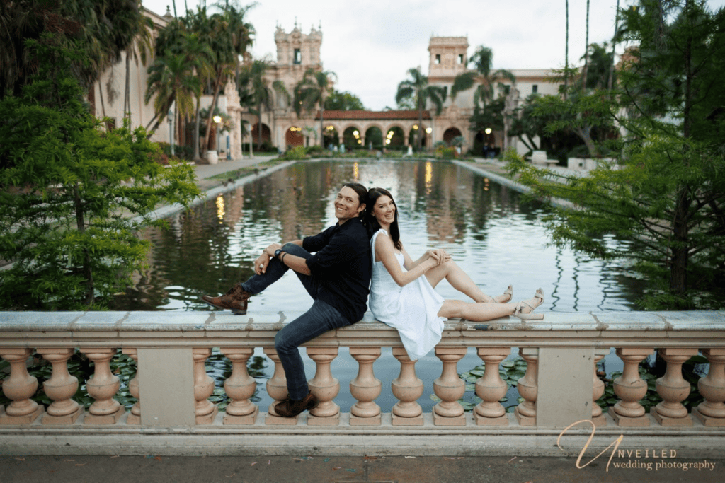 Happy couple at Balboa Park—find the best engagement photographer cost San Diego.