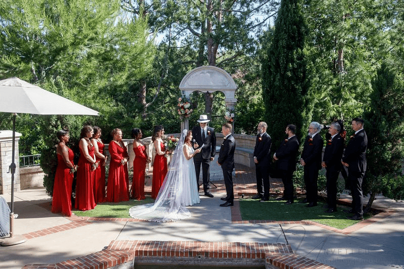 Outdoor garden wedding ceremony during a multi-day San Diego wedding weekend.
