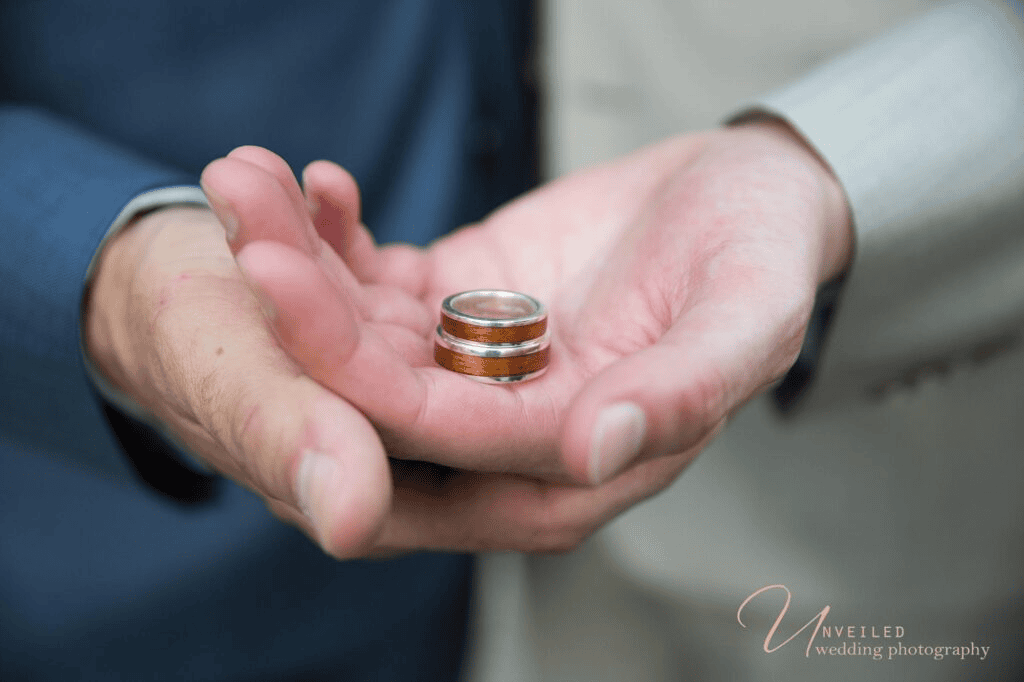 Wedding bands detail shot captured by same-sex wedding photographer in San Diego team.