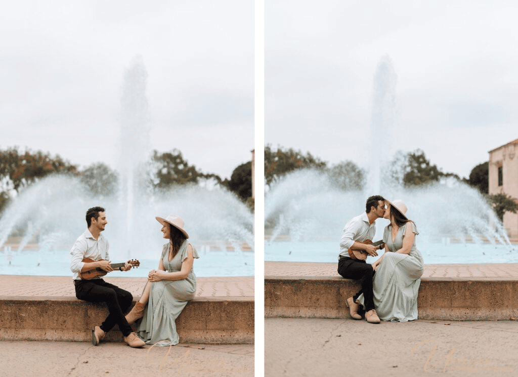 Man playing ukulele for fiancé by water fountain for musical Engagement Photo Ideas.