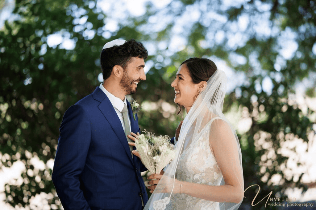 Laughing bride and groom candid shot for Wedding Album vs Digital Gallery selection.