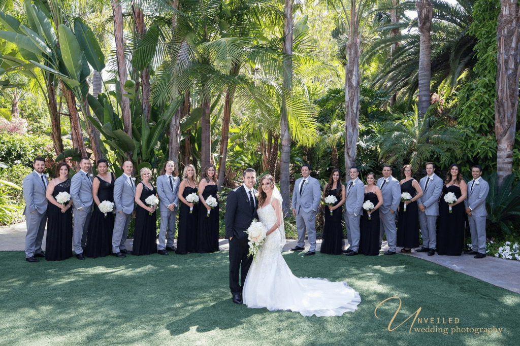 Wedding party in garden venue taken by Grand Tradition Estate Wedding Photographer.